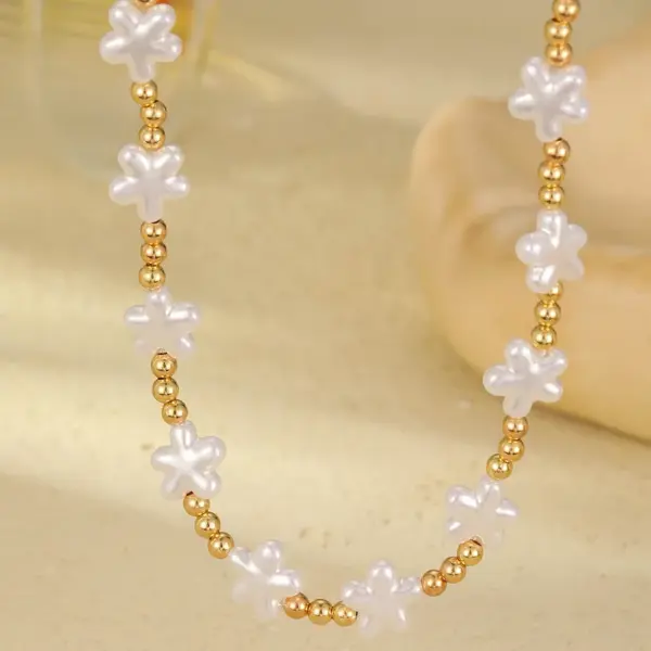 Wholesale Women’s Star Choker Necklace With Waterproof Non Tarnish Copper, Golden Plated Finish And Imitation Pearl Beaded Chain