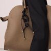 oly-350ee888e1393554324b59aecf8d9484 Wholesale selling high-end all-match jewelry pendant trend woven bag mobile phone case key chain pendant