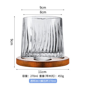 Transparent glacier rotating whiskey glass with wooden holder