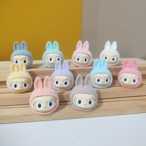 Wholesale cartoon flocking resin small pendant cloth ugly cute doll doll blind box small gift