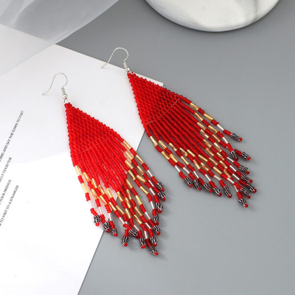 oly-381593c9fd24396a99c73486f2506d4f Wholesale Original Design Handmade Rice Bead Tassel Earrings Personalized Bohemian Tassel Earrings