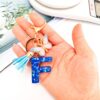 Wholesale blue crystal epoxy letter key chain pendant resin sequined butterfly key chain batch