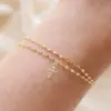 Wholesale 2 Pieces/Set Women's Jewelry Bracelet Set Beach Vacation Style Cross Heart Shape Water Plated Copper Zircon Asymmetric Sparkling Zircon Pendant Lip Chain Stacking