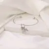Wholesale Waterproof Non Tarnish Cross Bangle For Women In 316 Stainless Steel With 18K Real Gold PVD Coated Plating