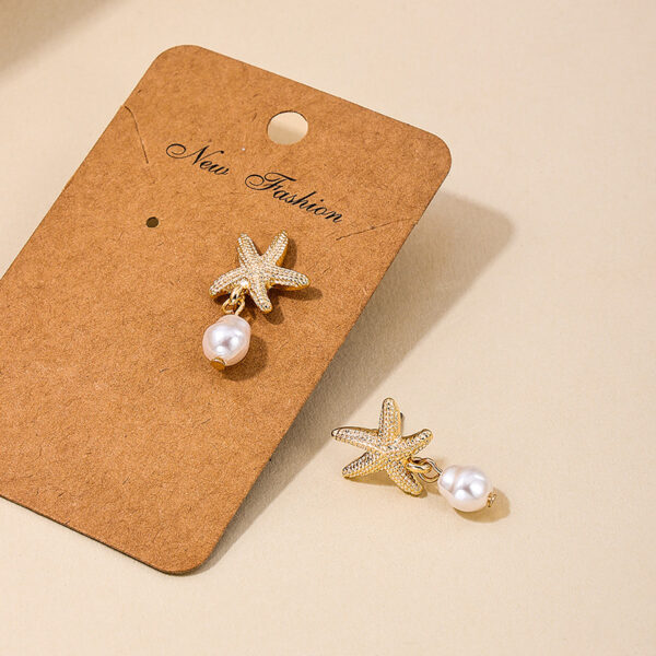 Wholesale 1 pair of summer temperament metal starfish pearl tassel ladies earrings earrings holiday style