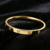 oly-3aa40c60fa4ec7bc6edd275e82459f64 Wholesale Stainless steel non-fading jewelry, gold-plated cross titanium steel bracelet