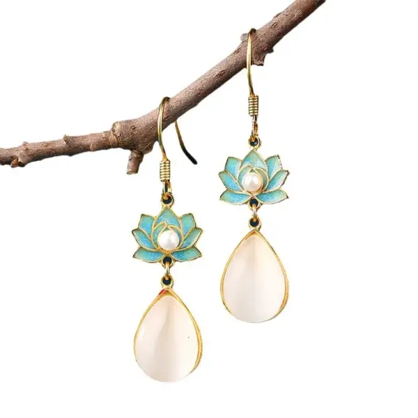 Wholesale Lotus Earrings For Women In Golden Plated Copper Featuring Freshwater Pearl Inlay