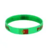 oly-3b7d277dd3b07291f96c22b0de07a33a Wholesale Multicolor Nordic Style Asymmetrical National Flag Wristband In Silica Gel With Nylon Chain Material For Couples