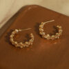 oly-3c07b86ac040127a8c60557e222df8f7 Wholesale selling niche personalized jewelry round bead woven stitching design copper material C-type earrings