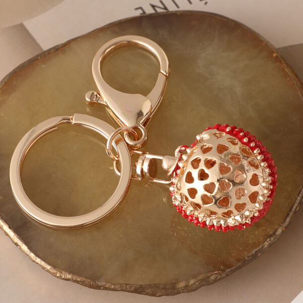 oly-3ccf4a68a41b2f9d644e497e5eb17d81 Wholesale Diamond-encrusted lychee car keychain women's bag pendant metal key chain fruit pendant gift