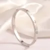 Wholesale PVD Coated Real Gold Plated 18K Gold Cross Heart Shape Flower 304 Stainless Steel Elegant Waterproof Non Tarnish 304 Stainless Steel Bangle