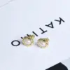 Wholesale European And American Cross-Border Niche High-End Oval Pearl Earrings For Women, Elegant Fashionable Simple Versatile Vacuum Electroplated 18K Gold Copper Earrings