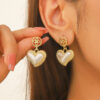 oly-3e32e60558eef8d59ad0bdc16c34346f Wholesale Jewelry Gift Peach Heart Earrings Exaggerated Baroque Pearl Love Earrings Valentine's Day Earrings