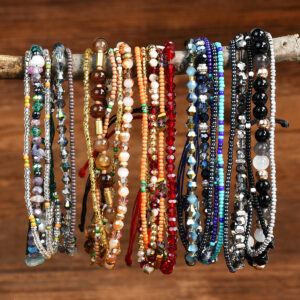 oly-3e62b12381a5a1011e2b04995990aa71 Wholesale Bohemian multi-layer natural gravel crystal beaded bracelet female minority high-end hand woven hand rope