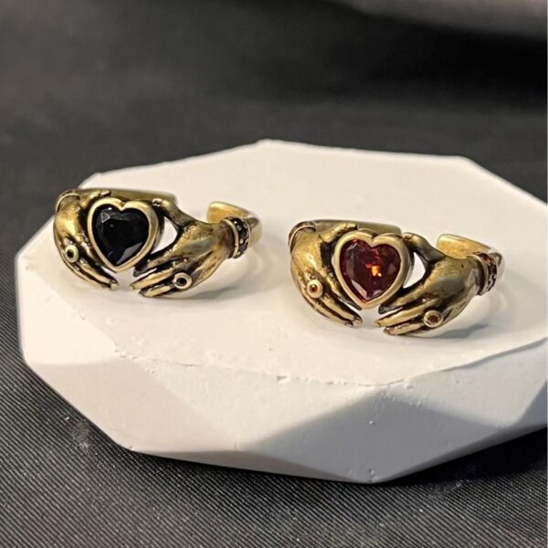 oly-3ed6eac8490e866a5f295843775d086a Wholesale Trendy Retro Carving Hands Embrace Red Zircon Couple's Ring Finger Ring Design All-match Valentine's Day for Women