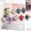 oly-3ee55f699af034b748461969d7d8d16a Wholesale Asymmetrical Irregular Stud Earrings For Women With May Birthstone Emerald In Golden Plated Zinc Alloy And Acrylic Inlay