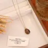 Wholesale Bohemian Water Droplets Pendant Necklace For Women With Gold Stone Texture And Rhinestone Inlay On Cable Chain