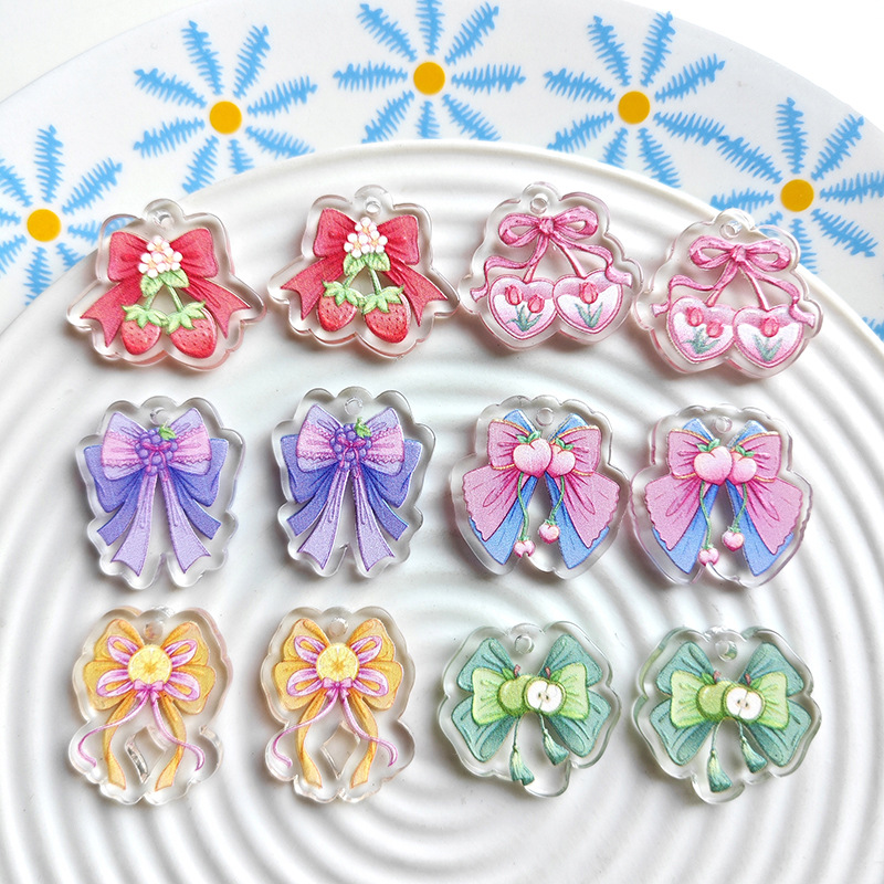 Wholesale Double-sided bow three-dimensional relief children's acrylic jewelry accessories DIY pendant with holes cartoon character cute