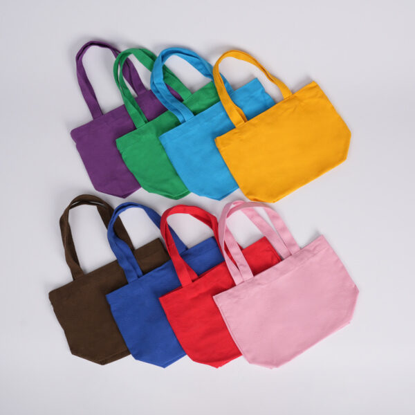 oly-40425c3f14cd1a37424a842f9af1d282 Wholesale 12 color cotton in stock canvas bag cute portable small cloth bag hand gift cotton bag