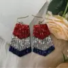 oly-409cea2287fd4d28955f69d926287ce3 Wholesale Christmas Series Tassel Trapezoidal Shaved Glossy Leather Earrings Faux Leather Jewelry Accessories
