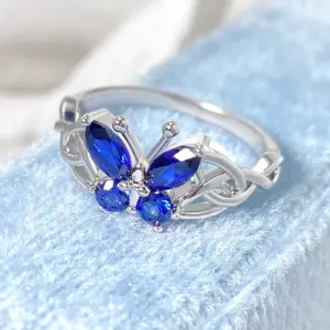 Wholesale Butterfly Claw Setting Ring For Women In Brass With 18K Real Gold Water Plating And Zircon Inlay