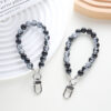 Wholesale Light Luxury Black and White Ink Beads Short Mobile Phone Chain Earphone Case Car Key Pendant Colorful Wrist Rope Handheld Chain Beads