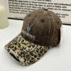 oly-442d57be103133e6e01cd0f762baba6c Wholesale Vintage Leopard Sweet Cool Rhinestone Letter Cap Women's Sanding Old Big Head Face Small Shade Baseball