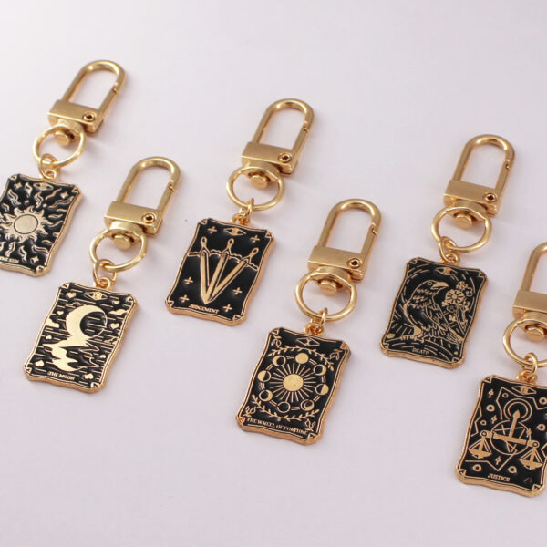 oly-44b04ab9afa8310b10442f8662cf90d0 Wholesale Keychain Dark Series Alloy Oil Dripping Bag Pendant Exquisite Gift Metal Pendant