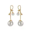 Wholesale French Retro Fashion Versatile Pearl Tassel Knotted Earrings Elegant Light Luxury Stainless Steel Earrings For Women Factory Direct Sale