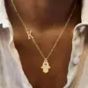Wholesale Simple Fashion Classic Micro Pave Zircon Fatima Hand Initial Pendant Gold Stainless Steel Paperclip Chain Women's Necklace