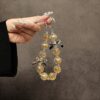 oly-457024f94f3d642995681b5c6afd5ee4 Wholesale Personalized Fashion Bow Mobile Phone Chain Short Wrist Handmade Beaded Mobile Phone Lanyard Mobile Phone Case Pendant