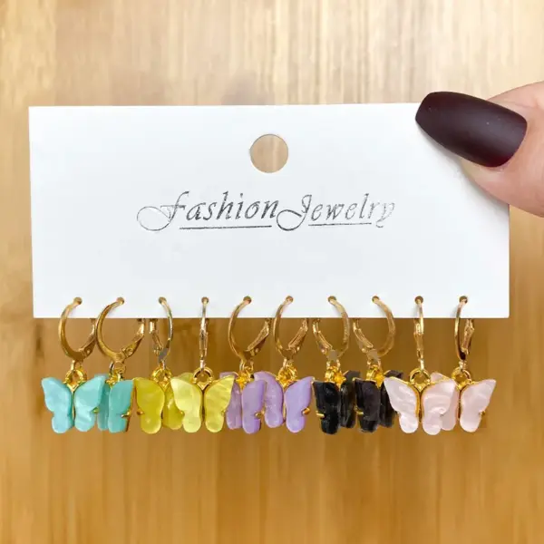 Wholesale Unisex Fashion Geometric Butterfly Alloy Artificial Pearls Earrings Drop Earrings
