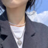 oly-46710366b45d64d27f300f30c7a02f71 Wholesale Korean blogger with Angel jelly love hollow diamond heart necklace titanium steel fashionable clavicle chain for women