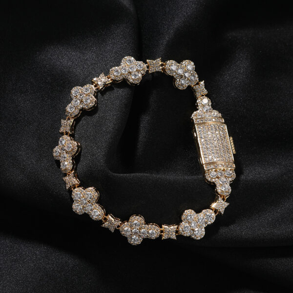 Wholesale Copper-set zircon cross flower bracelet with micro-painted zircon, elegant and sparkling jewelry.