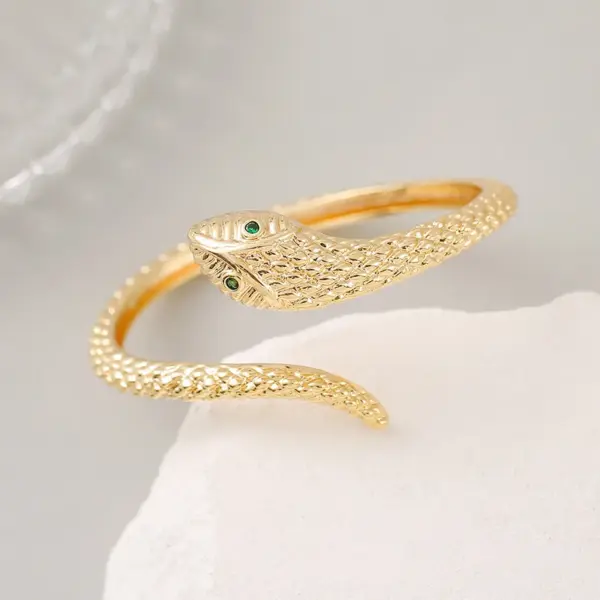Wholesale Snake Pattern Bangle In Copper With 14K Real Gold Electroplated Finish Featuring Zircon Inlay In Gold