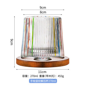 Contrast color vertical pattern rotating whiskey glass with wooden holder