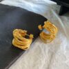 Wholesale autumn and winter gold-plated hollow winding C-shaped circle earrings retro high-end earrings