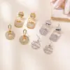 Wholesale Summer Refreshing Diamond-Embedded Easy-Pull Can Letter Plated 14K Real Gold Copper Geometric Pattern Earrings Light Luxury High-End Niche Temperament Stud Earrings