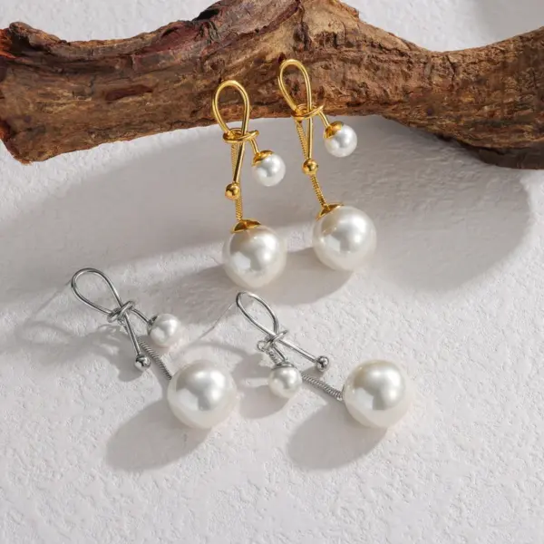 Wholesale French Retro Fashion Versatile Pearl Tassel Knotted Earrings Elegant Light Luxury Stainless Steel Earrings For Women Factory Direct Sale