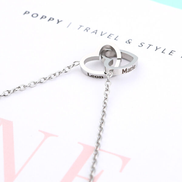 oly-49758231c0dafe78aa9edb593cf37ee1 Wholesale fashion simple stainless steel vacuum plating cross chain love lettering necklace Valentine's Day gift