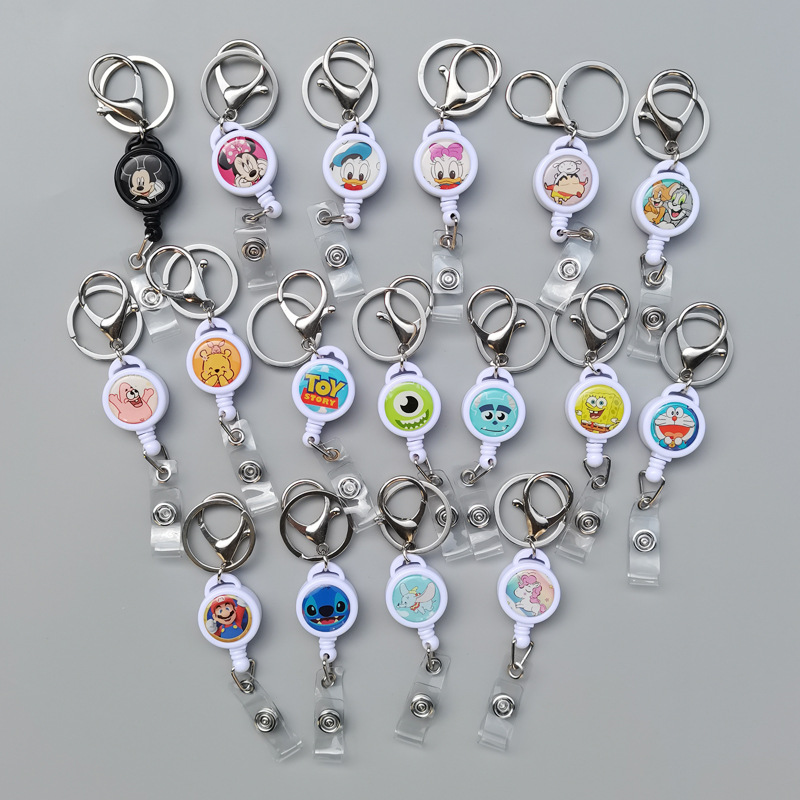 Wholesale Cross-border in stock cartoon glue drop retractable easy pull buckle manufacturers ID buckle round easy pull badge metal buckle