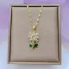 Wholesale 201 Stainless Steel Copper Flower Water Plating Vacuum Plating Zircon 18K Gold Plated 18K Gold Simple Style Coffee Bean Chain Transparent Gold Pendant Necklace