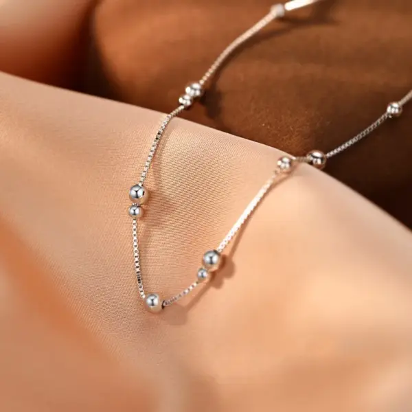 Wholesale Simple Style Ball Bracelet For Women In 925 Sterling Silver With Electroplated Gold Plating Featuring Beading Craft