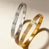 Wholesale Luxurious Rose Gold Oval Inlay Bangle For Women In Titanium Steel With Zircon Detailing