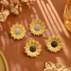 Wholesale Sunflower Stud Earrings For Women In Dyed Black Copper With Real Gold Plated Finish