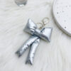 oly-4c67299bfbe4df6672c98faa6f618188 Wholesale Korean Style Ins Fashionable Sweet Girl's Padded Cotton Bow Bag Hanging Fashionable Trendy Keychain Pendant for Women