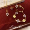 Wholesale Copper four-leaf clover window decoration charoite jewelry set necklace bracelet earring ring