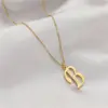 Wholesale Unisex Letter Pendant Necklace In Titanium Steel With Electroplated Gold Plating And Zircon Inlay