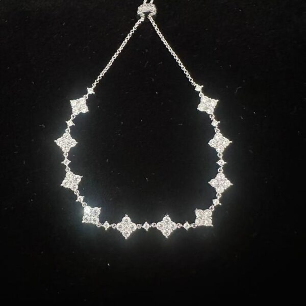 Wholesale Electroplated alloy four-leaf clover bracelet, full diamond shooting star bracelet, adjustable star jewelry