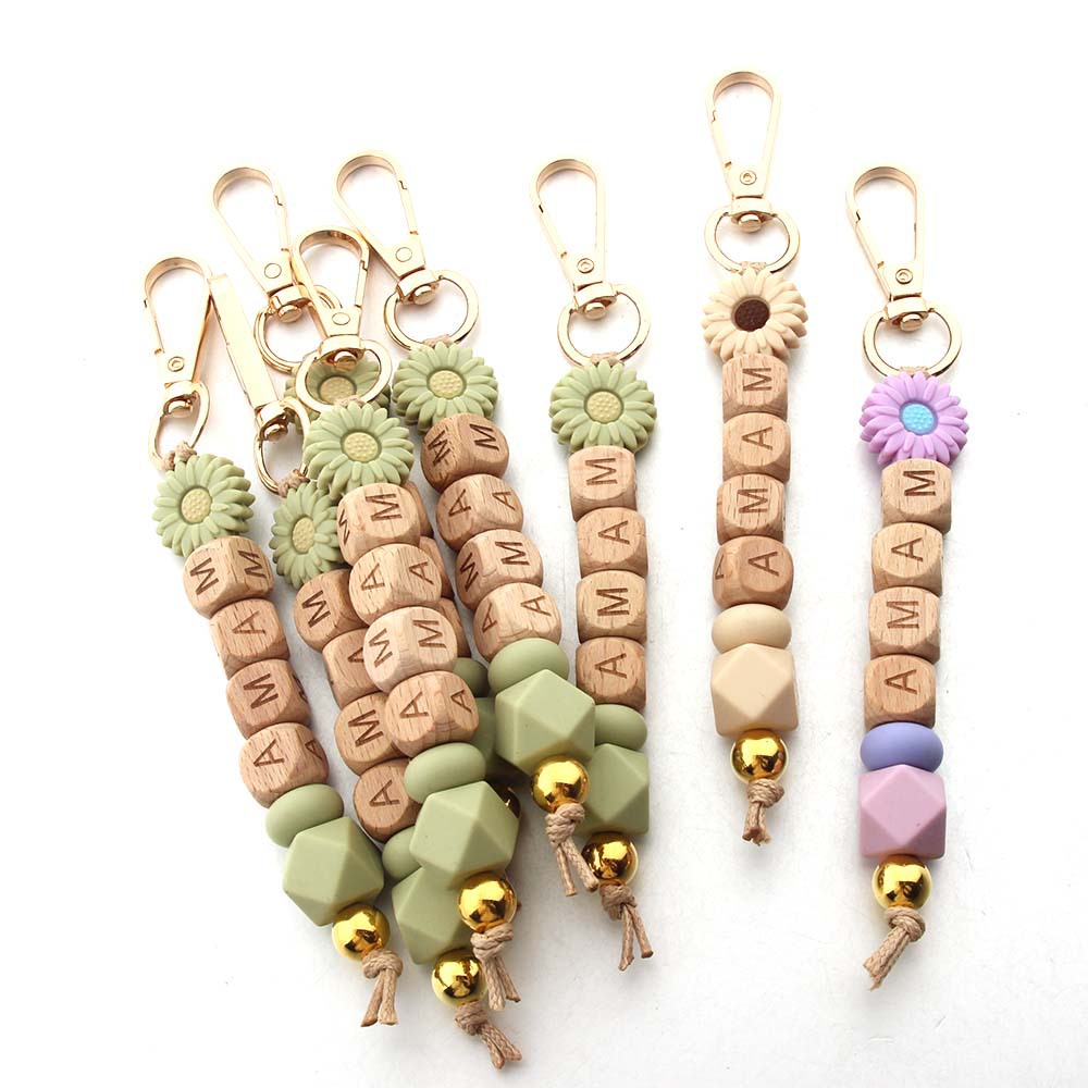 Wholesale 2025 Hot Sale Silicon Silicon Daisy Silicone Beads Keychain Letters MAMA Bag Sunflower Bag Pendant Jewelry